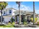 Beautiful home featuring landscaped front yard, stone accents and a columned porch at 13722 Fox Glove St, Winter Garden, FL 34787