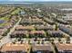 Extensive aerial view showcasing a well-planned residential community with diverse homes and landscaping at 14040 Helsby St, Orlando, FL 32832