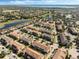 Sprawling aerial view of an expansive residential community featuring diverse housing and streetscapes at 14040 Helsby St, Orlando, FL 32832