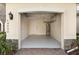 Spacious two-car garage with clean epoxy floors and ample storage racks at 14040 Helsby St, Orlando, FL 32832
