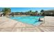 Soak up the sun in this community pool featuring a refreshing design with plenty of lounge seating at 14040 Helsby St, Orlando, FL 32832