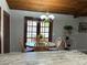 Cozy dining area with natural light streaming in from the french doors at 1500 Markham Woods Rd, Longwood, FL 32779