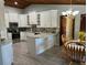 Modern kitchen featuring white cabinetry and stainless-steel appliances at 1500 Markham Woods Rd, Longwood, FL 32779