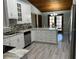 Spacious kitchen with granite countertops and updated stainless-steel appliances at 1500 Markham Woods Rd, Longwood, FL 32779