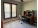 Office with desk and shelving, a window, and a tile floor at 1500 Markham Woods Rd, Longwood, FL 32779
