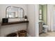 Stylish half-bathroom with floating wooden shelf and decorative baskets and plants at 15446 Orchard Garden St, Winter Garden, FL 34787
