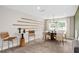 Charming dining area with plush carpeting, modern decor, and large windows at 15446 Orchard Garden St, Winter Garden, FL 34787