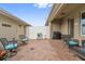 Charming outdoor patio, complete with brick flooring and outdoor seating at 15456 Blackbead St, Winter Garden, FL 34787