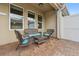 Relaxing outdoor patio with comfortable seating, perfect for enjoying the weather at 15456 Blackbead St, Winter Garden, FL 34787