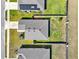 Aerial view of a well-maintained home with a backyard and landscaping at 1579 Swan Lake Cir, Dundee, FL 33838
