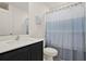 Neat bathroom with modern fixtures, a shower and tub, and a vanity at 1579 Swan Lake Cir, Dundee, FL 33838
