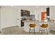 Modern kitchen with granite countertops and stainless steel appliances at 1579 Swan Lake Cir, Dundee, FL 33838