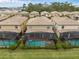 Stunning aerial view of the home, showcasing a private pool, spa, and expansive backyard at 1639 Lima W Ave, Kissimmee, FL 34747
