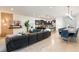 Spacious open-concept living room with an attached kitchen and dining area at 1639 Lima W Ave, Kissimmee, FL 34747