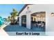 Chic resort bar and lounge with open-air access and comfortable seating, ideal for socializing at 1639 Lima W Ave, Kissimmee, FL 34747
