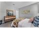 Comfortable bedroom with modern furnishings, a TV, and soft, inviting colors at 1806 Paloma Ave, Sanford, FL 32771