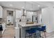 Modern kitchen boasts an island, stainless steel appliances, granite countertops, and ample cabinet space at 1806 Paloma Ave, Sanford, FL 32771