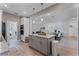 Open floor plan showcases a kitchen island with granite countertops and a view of the dining and living areas at 1806 Paloma Ave, Sanford, FL 32771
