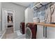Well-organized laundry room with modern washer and dryer, storage cabinets, and stylish decor at 1806 Paloma Ave, Sanford, FL 32771