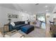 Spacious living room featuring stylish furnishings, hardwood floors, and access to the backyard at 1806 Paloma Ave, Sanford, FL 32771