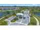 Aerial view of the community's gated entrance, showcasing the well-maintained landscaping at 2011 Soaring Oak Way, Winter Park, FL 32792