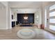Welcoming entryway with wood floors, modern lighting, and a view of the dining room at 2011 Soaring Oak Way, Winter Park, FL 32792