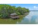 Scenic lakeside gazebo offering serene views and a peaceful retreat at 2011 Soaring Oak Way, Winter Park, FL 32792