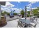 Outdoor kitchen and table seating provides a space for residents to gather and socialize at 2011 Soaring Oak Way, Winter Park, FL 32792