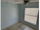 Bedroom with tile floors and a window providing natural light at 214 Magellan Dr, Kissimmee, FL 34758