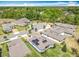 Aerial view of a residential neighborhood showcasing well-maintained homes with solar panels at 231 Cherokee Hill Ct, Deland, FL 32724