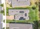 Overhead view showing the house roof with solar panels, lawn and well-maintained landscaping at 231 Cherokee Hill Ct, Deland, FL 32724