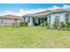 Well-maintained backyard with a patio, perfect for outdoor dining and relaxation at 231 Cherokee Hill Ct, Deland, FL 32724