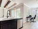 Updated kitchen with stainless steel appliances, shaker style cabinets, tile backsplash, and quartz countertop at 231 Cherokee Hill Ct, Deland, FL 32724