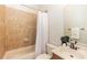 Bathroom with tub shower combo and updated vanity at 25813 Feather Ridge Ln, Sorrento, FL 32776