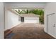 The paver driveway leads to the garage and porte-cochere, providing ample parking at 25813 Feather Ridge Ln, Sorrento, FL 32776