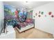 Fun themed bedroom featuring colorful superhero decor and comfortable accommodations at 2659 Calistoga Ave, Kissimmee, FL 34741