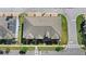 Aerial view of modern townhomes with well-maintained landscaping and community streets at 2694 Giardino Loop, Kissimmee, FL 34741