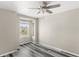 Bright bedroom with large window and ceiling fan at 2694 Giardino Loop, Kissimmee, FL 34741