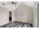 Vacant bedroom with gray flooring and ensuite bathroom at 2694 Giardino Loop, Kissimmee, FL 34741