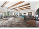 Spacious clubhouse with ample seating, billiard table, and large windows, perfect for community gatherings at 2694 Giardino Loop, Kissimmee, FL 34741