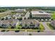 Beautiful townhouse with grey exterior, landscaping, and charming street appeal in a well-maintained community at 2694 Giardino Loop, Kissimmee, FL 34741