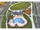 Beautiful aerial view of the community pool, park, and recreational facilities at 3002 Voyager Ave, St Cloud, FL 34771