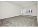 Unfurnished room with carpet, natural light and neutral walls at 3002 Voyager Ave, St Cloud, FL 34771
