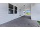 Spacious carport with brick pavers, offering ample covered parking and architectural detail at 3002 Voyager Ave, St Cloud, FL 34771