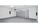 Clean, spacious garage with an automatic door, providing ample storage and parking at 3002 Voyager Ave, St Cloud, FL 34771