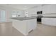 Well-equipped kitchen with granite countertops, stainless steel appliances, and abundant natural light at 3002 Voyager Ave, St Cloud, FL 34771