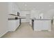 Spacious kitchen with stainless appliances, granite countertops, and tile flooring offering modern conveniences at 3002 Voyager Ave, St Cloud, FL 34771