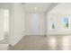 Bright and spacious living room featuring neutral paint and tile floors at 3002 Voyager Ave, St Cloud, FL 34771