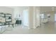 Open-concept living area with modern furnishings and tile flooring at 3002 Voyager Ave, St Cloud, FL 34771