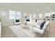 Bright and airy living room with modern furnishings and open floor plan, perfect for entertaining at 3002 Voyager Ave, St Cloud, FL 34771